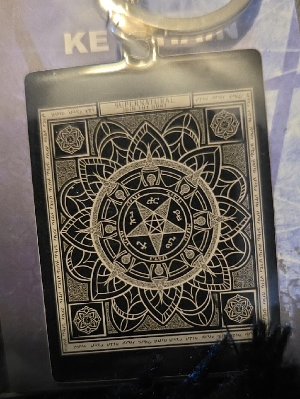 Supernatural Black and Silver Keychain with Intricate Mandala Design - Picture 2 of 3